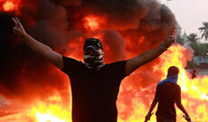 İraqda polis aksiyaçılara atəş açdı, ölənlər var