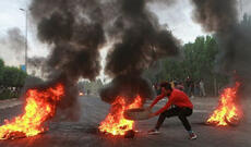 İraqda polislə etirazçılar arasında toqquşma oldu - 25 ölü, 223 yaralı