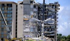 12 mərtəbəli yaşayış binasının çökməsi nəticəsində ölənlərin sayı durmadan artır