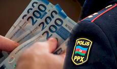 Polis əməliyyat zamanı 100 min dollar götürüb – Sensasion iddia + Video