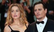 Amber Herd keçmiş əri Conni Depə bir milyon dollar təzminat ödəyəcək