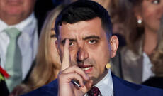 İfrat sağçı siyasətçi Simion Rumıniyada prezident seçkilərinin nəticələrini ləğv etməyə çağırır