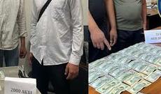Özbəkləri ABŞ və Yaponiyaya göndərəcəyini vəd edənlər saxlanılıb