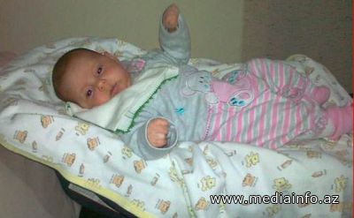 11-ci mərtəbədən yıxılan körpə sağ qaldı - Foto