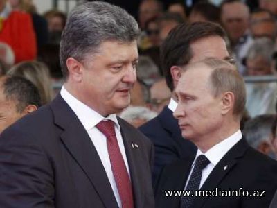 Olland Putinlə Poroşenkonu görüşdürəcək