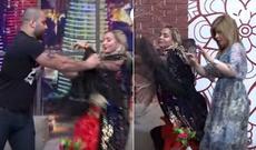 Azərbaycan efirində biabırçılıq - Rəqqasəni döydü, üstünə su atdı-video