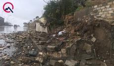 Bakıda daha bir sürüşmə: Qəbirstanlığın divarı uçdu