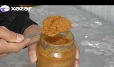 Bakı sakini mağazadan aldığı yağı əridərkən dəhşətə gəldi - VİDEO